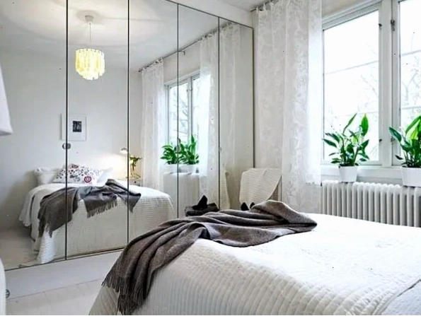 Hóa giải phong thủy phòng ngủ giường ngủ đối diện cửa ra vào